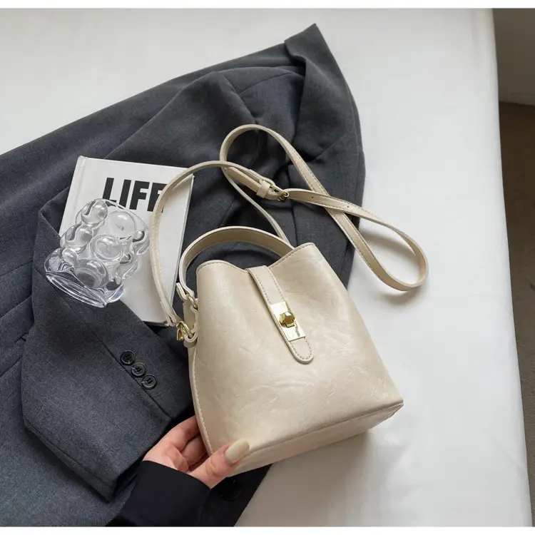 Women's Beige Bucket Bag with Gold Plated Handles — feature 22