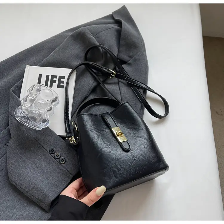 Women's Beige Bucket Bag with Gold Plated Handles — feature 23