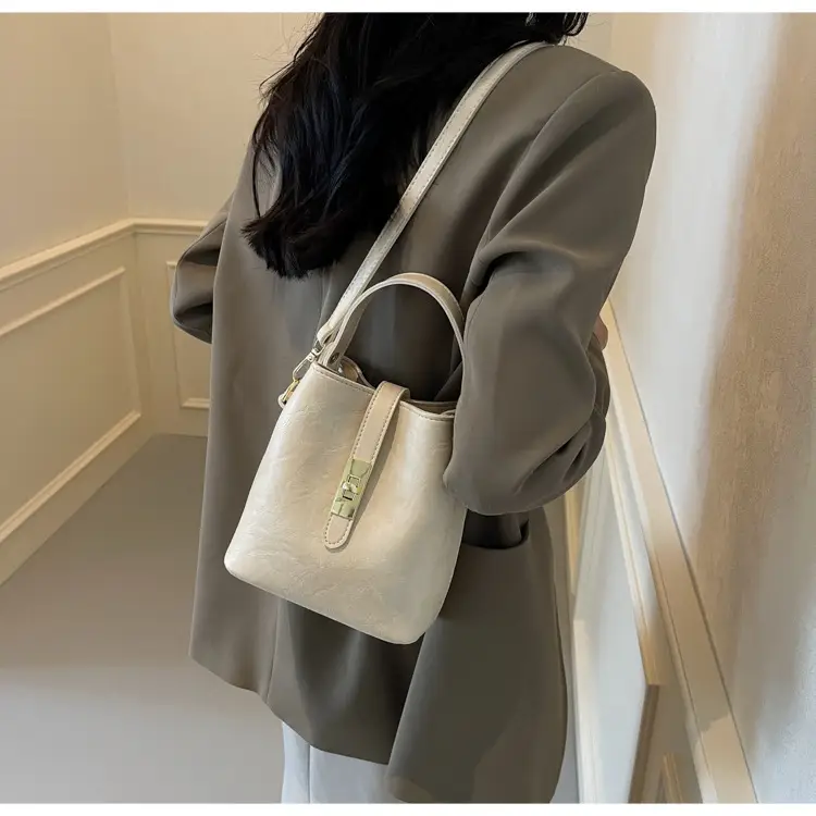 Women's Beige Bucket Bag with Gold Plated Handles — feature 31