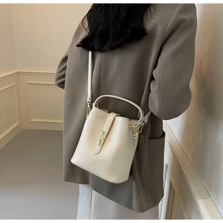 Women's Beige Bucket Bag with Gold Plated Handles — feature 34