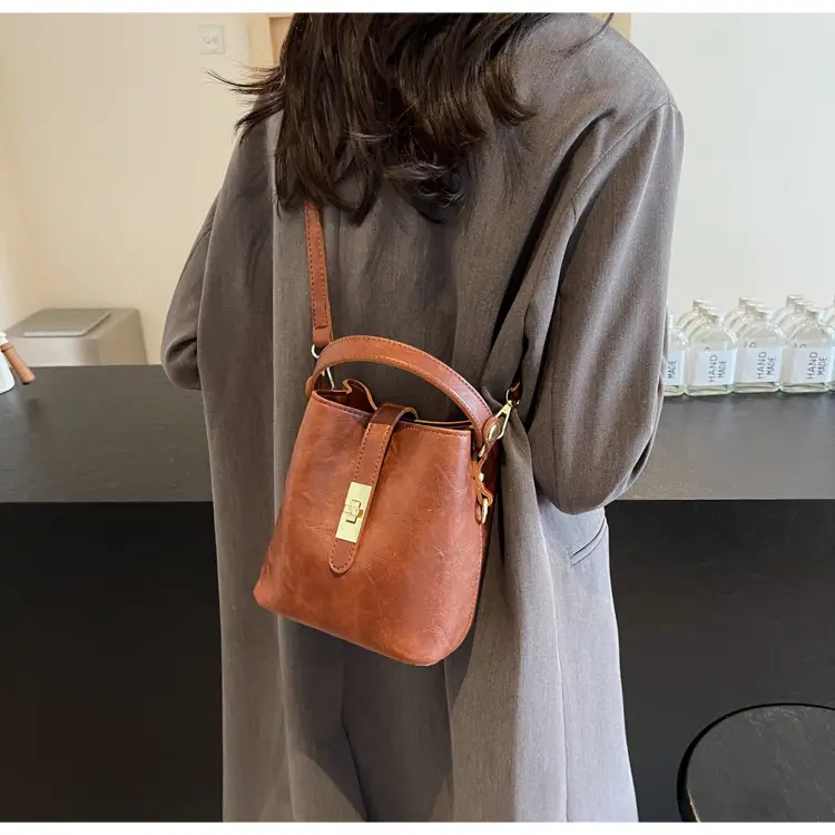 Women's Beige Bucket Bag with Gold Plated Handles — feature 39