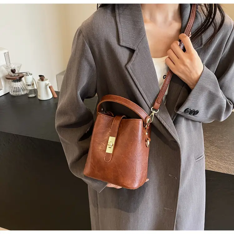 Women's Beige Bucket Bag with Gold Plated Handles — feature 40