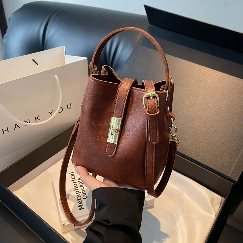 Women's Beige Bucket Bag with Gold Plated Handles - Image 2