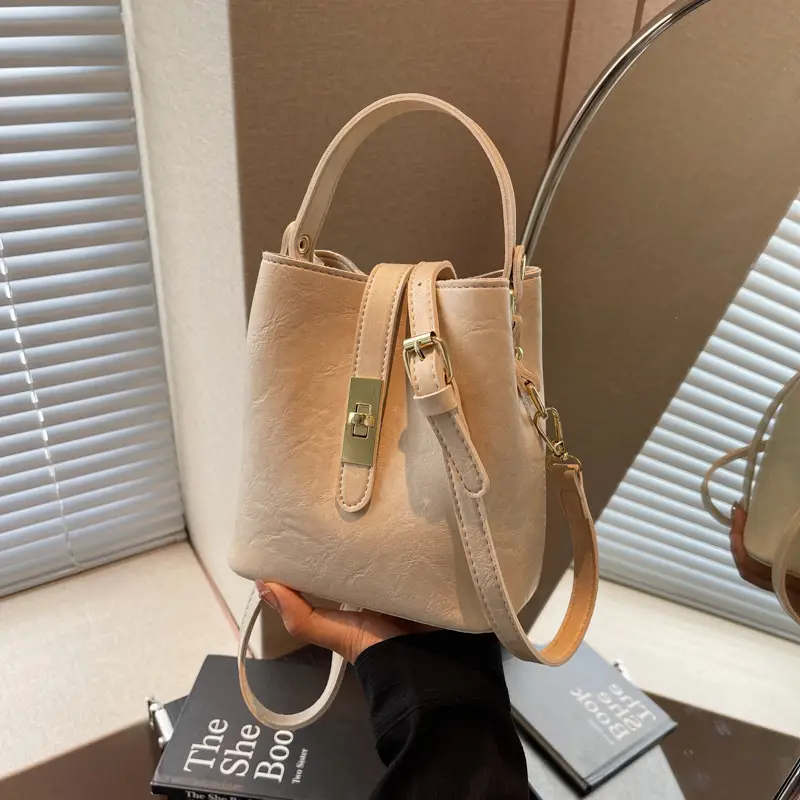 Women's Beige Bucket Bag with Gold Plated Handles - Image 3