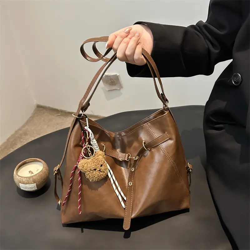 Brown Leather Shoulder Bag with Tassel Decor - Image 4
