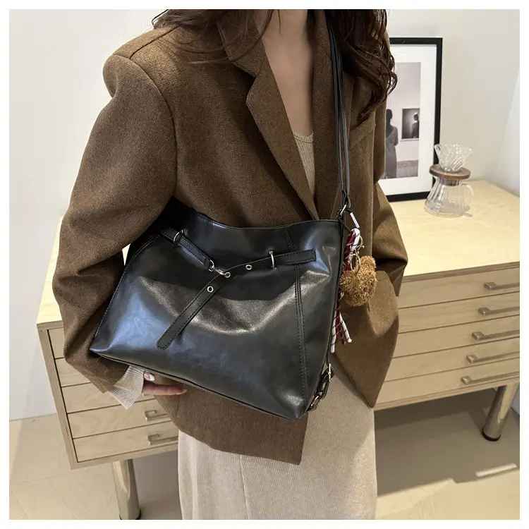 Brown Leather Shoulder Bag with Tassel Decor — feature 20