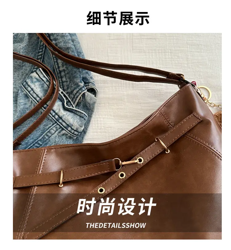 Brown Leather Shoulder Bag with Tassel Decor — feature 3