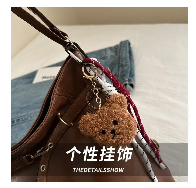 Brown Leather Shoulder Bag with Tassel Decor — feature 5