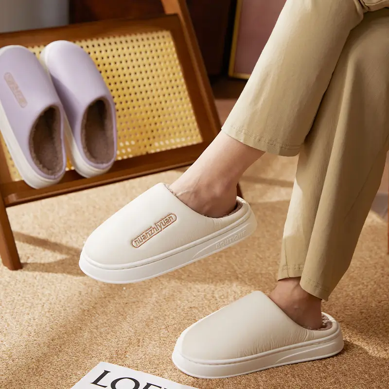 Nanbo Wan waterproof cotton slippers women's winter indoor home simple warm fleece-lined lovers Baotou slippers men's wholesale