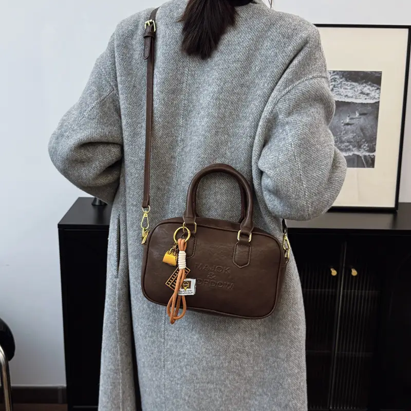 Women's Brown Leather Handbag with Gold Plated Handles - Image 9