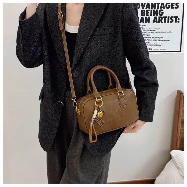 Women's Brown Leather Handbag with Gold Plated Handles — feature 17