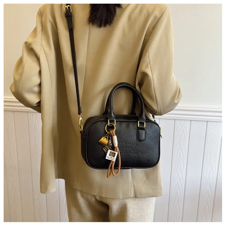 Women's Brown Leather Handbag with Gold Plated Handles — feature 22