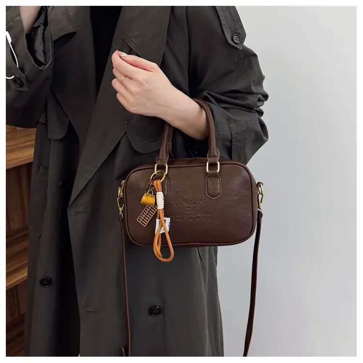 Women's Brown Leather Handbag with Gold Plated Handles — feature 25