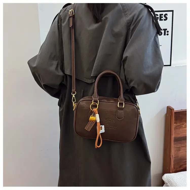 Women's Brown Leather Handbag with Gold Plated Handles — feature 26