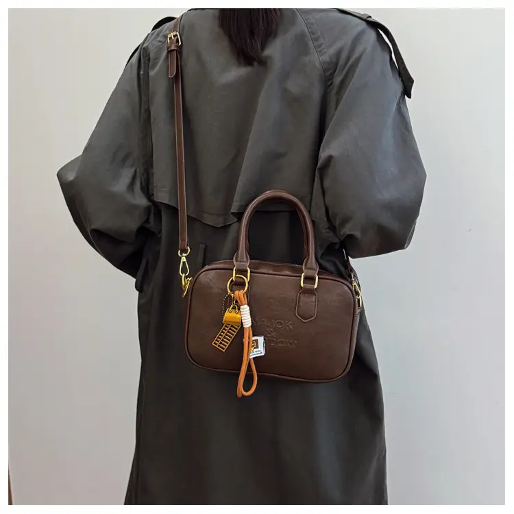 Women's Brown Leather Handbag with Gold Plated Handles — feature 27