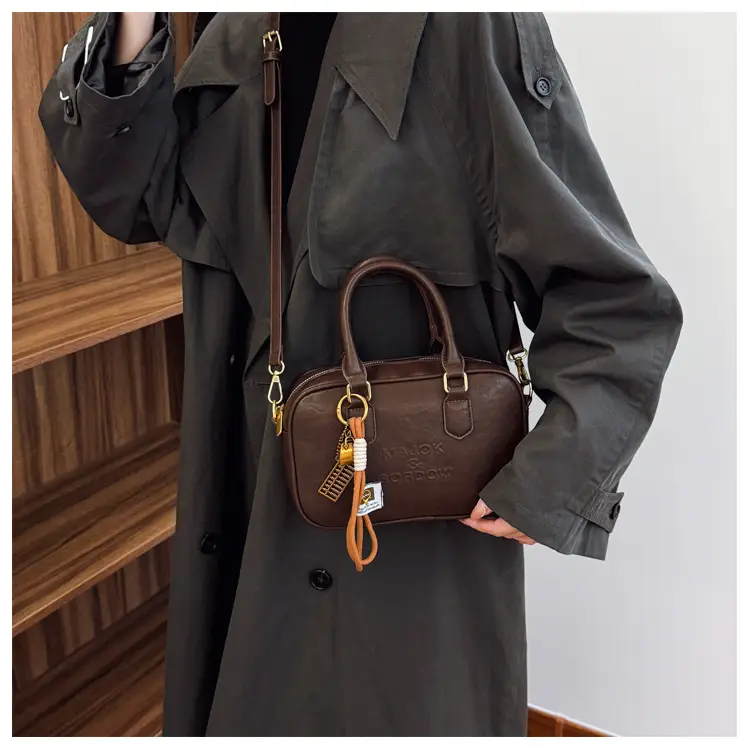 Women's Brown Leather Handbag with Gold Plated Handles — feature 28