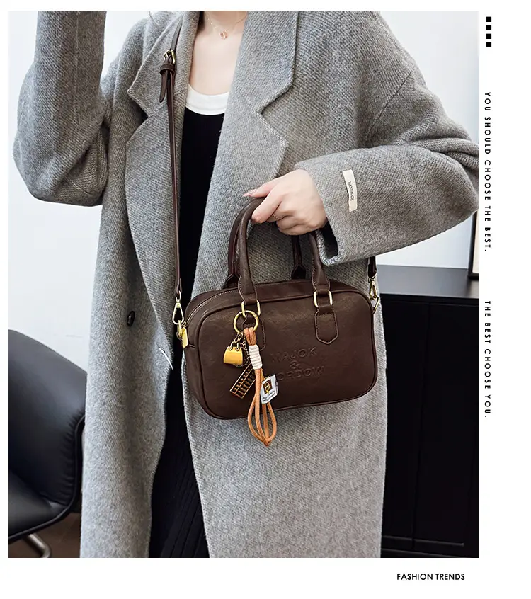 Women's Brown Leather Handbag with Gold Plated Handles — feature 3