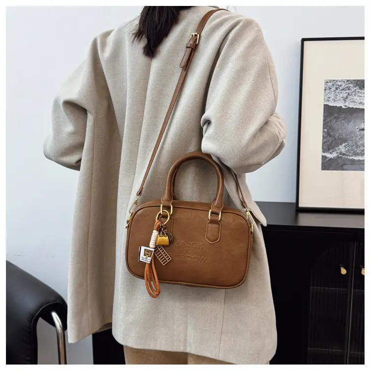 Women's Brown Leather Handbag with Gold Plated Handles — feature 33