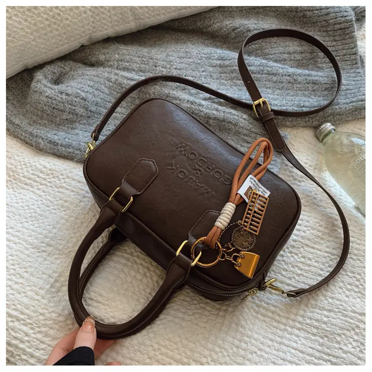Women's Brown Leather Handbag with Gold Plated Handles — feature 44
