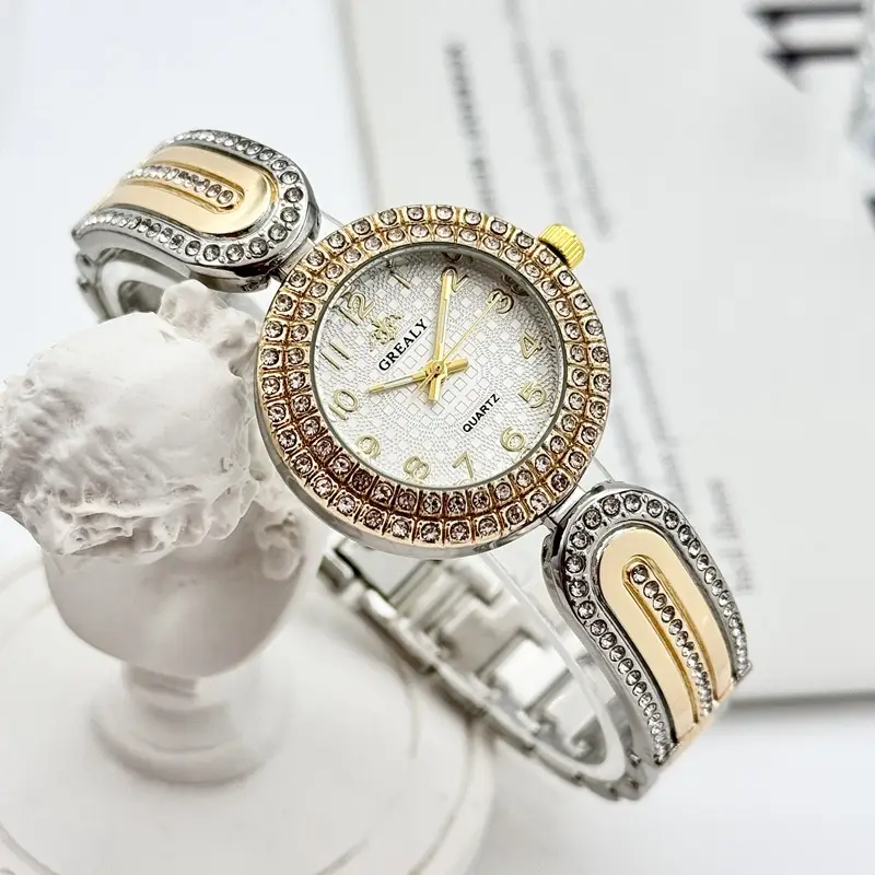 Gold Diamond-Encrusted Women's Watch with Green Dial