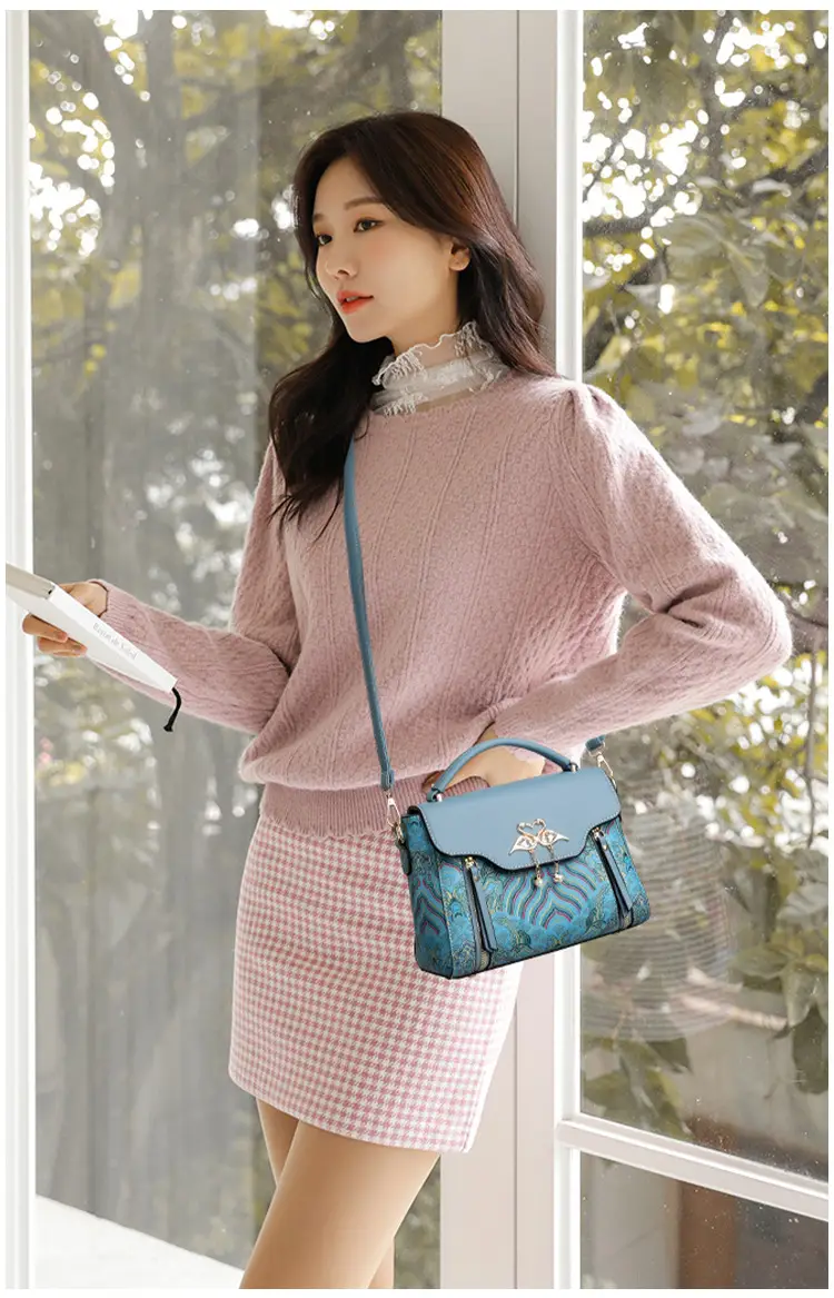 Women's Black Leather Crossbody Bag with Red Accessories — feature 17