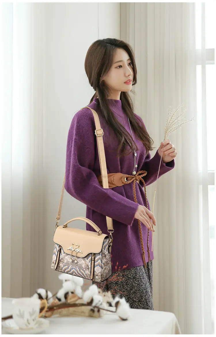 Women's Black Leather Crossbody Bag with Red Accessories — feature 18