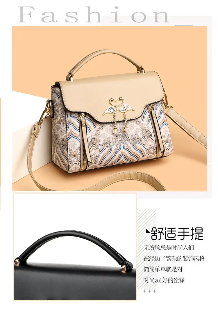 Women's Black Leather Crossbody Bag with Red Accessories — feature 7