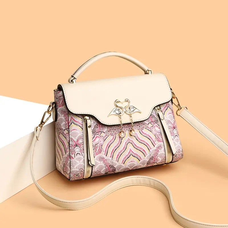Women's Black Leather Crossbody Bag with Red Accessories