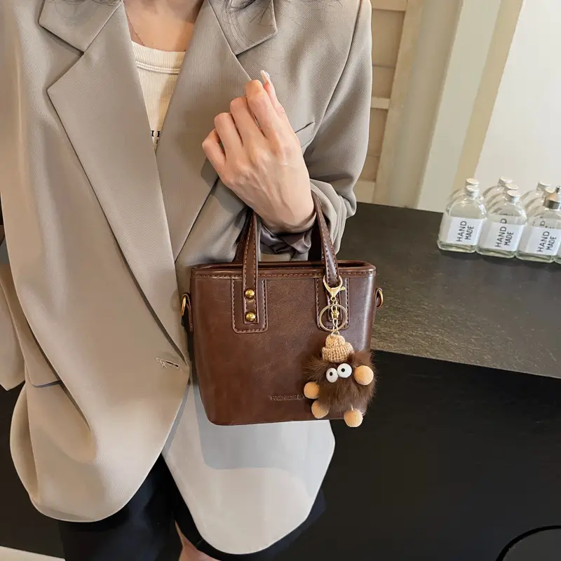 Women's Small Square Handbag with Pom Pom Detail