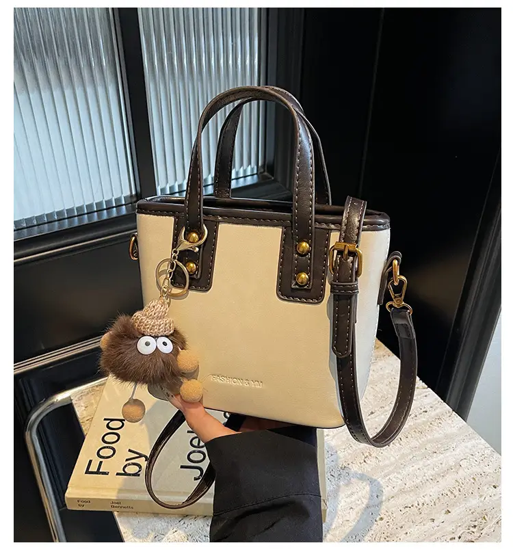 Women's Small Square Handbag with Pom Pom Detail — feature 1