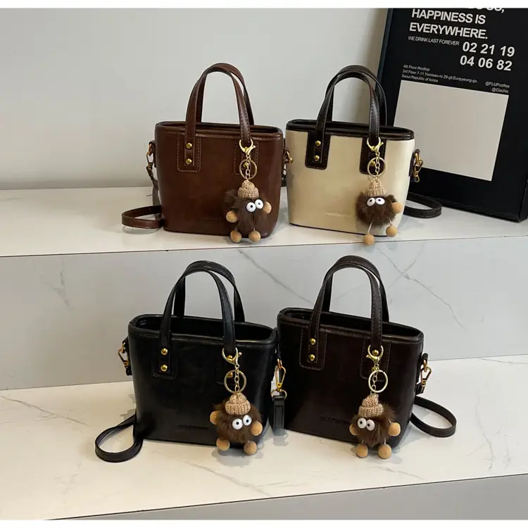 Women's Small Square Handbag with Pom Pom Detail — feature 11