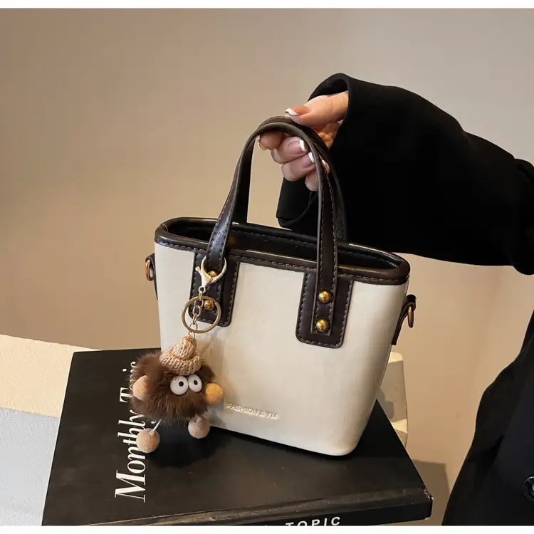Women's Small Square Handbag with Pom Pom Detail — feature 13