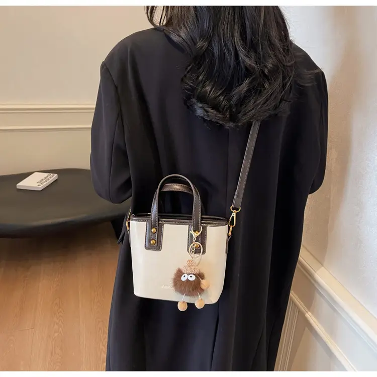 Women's Small Square Handbag with Pom Pom Detail — feature 21