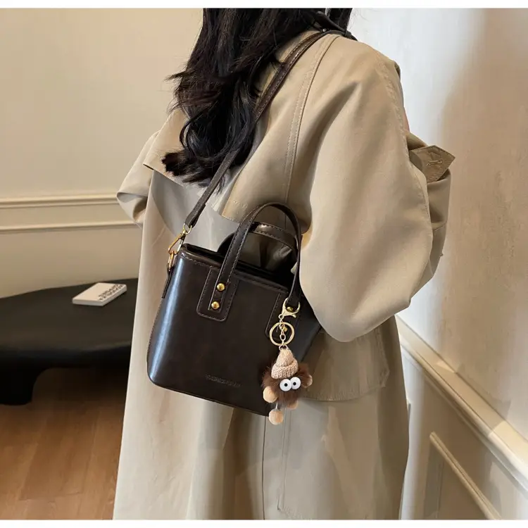 Women's Small Square Handbag with Pom Pom Detail — feature 23