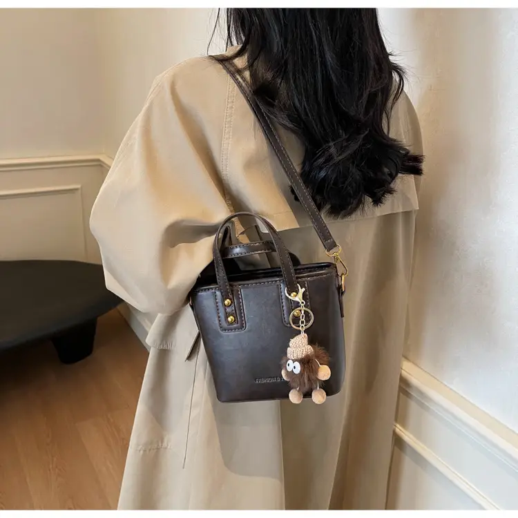 Women's Small Square Handbag with Pom Pom Detail — feature 24