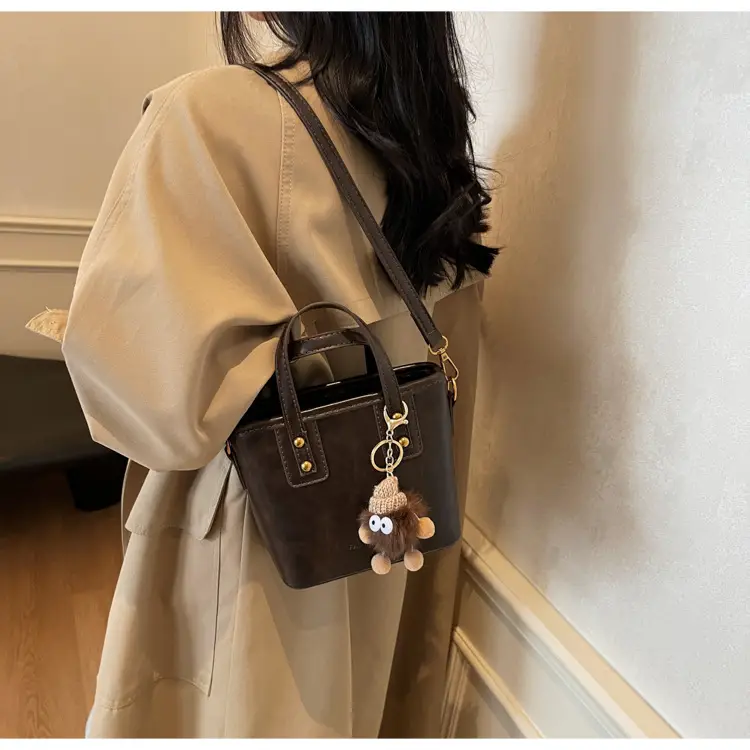 Women's Small Square Handbag with Pom Pom Detail — feature 25