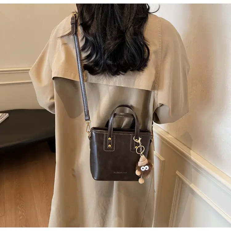 Women's Small Square Handbag with Pom Pom Detail — feature 26