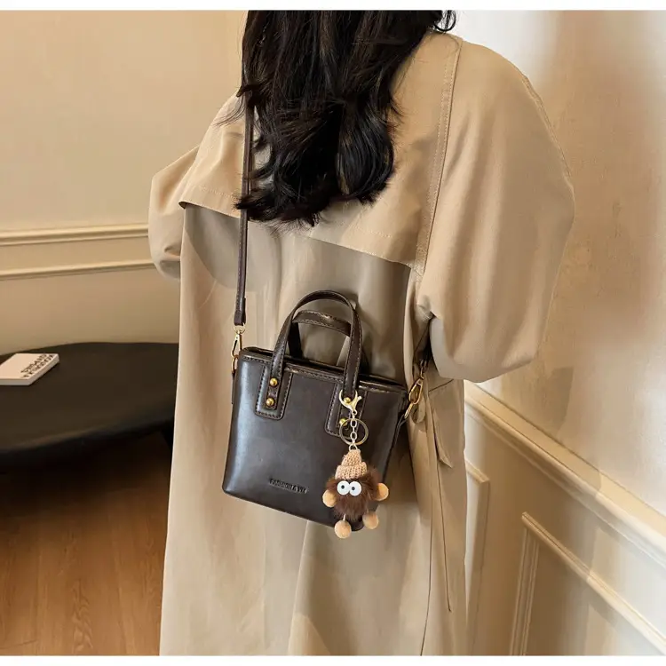 Women's Small Square Handbag with Pom Pom Detail — feature 27