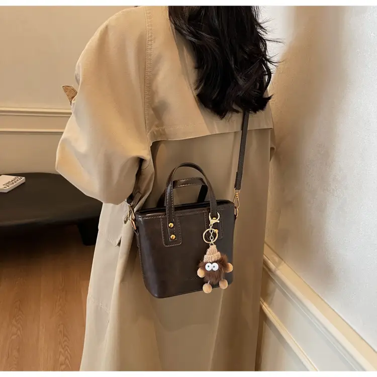 Women's Small Square Handbag with Pom Pom Detail — feature 28