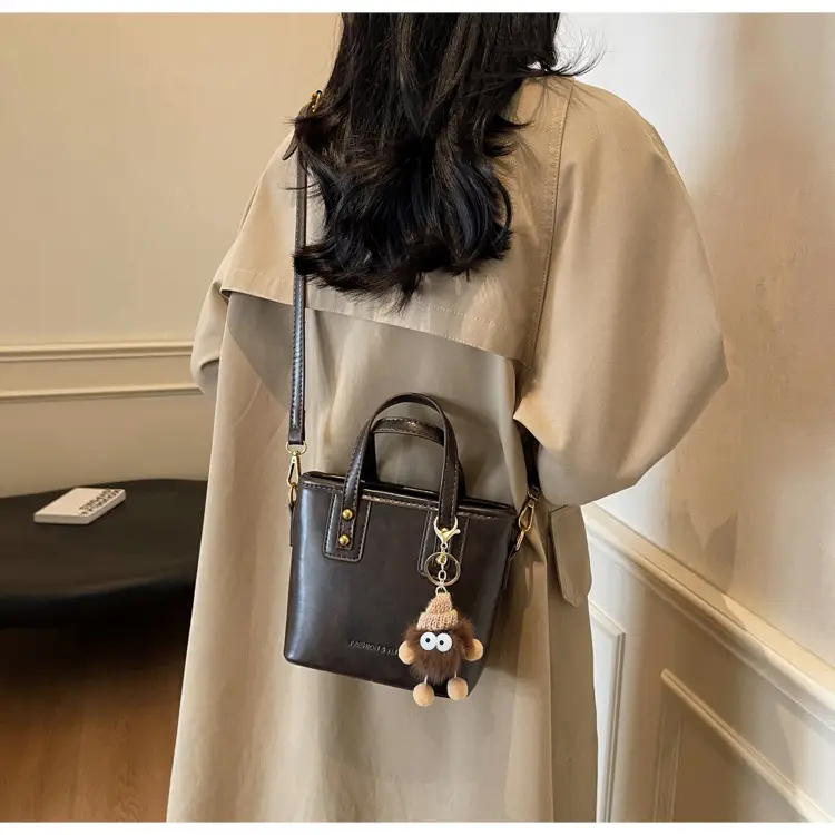 Women's Small Square Handbag with Pom Pom Detail — feature 29