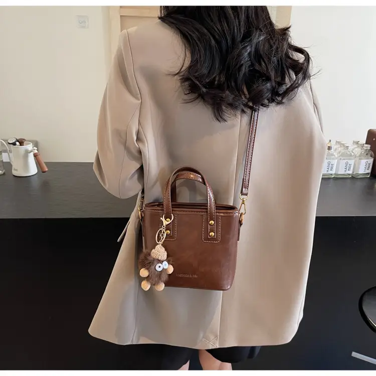 Women's Small Square Handbag with Pom Pom Detail — feature 33