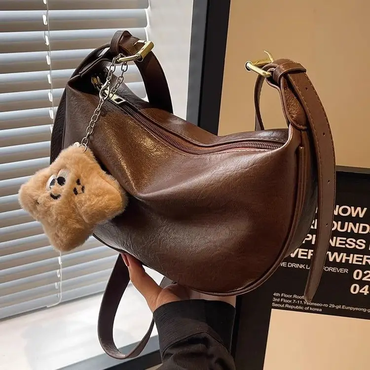 Women's Brown Textured Shoulder Bag with Faux Fur Charm