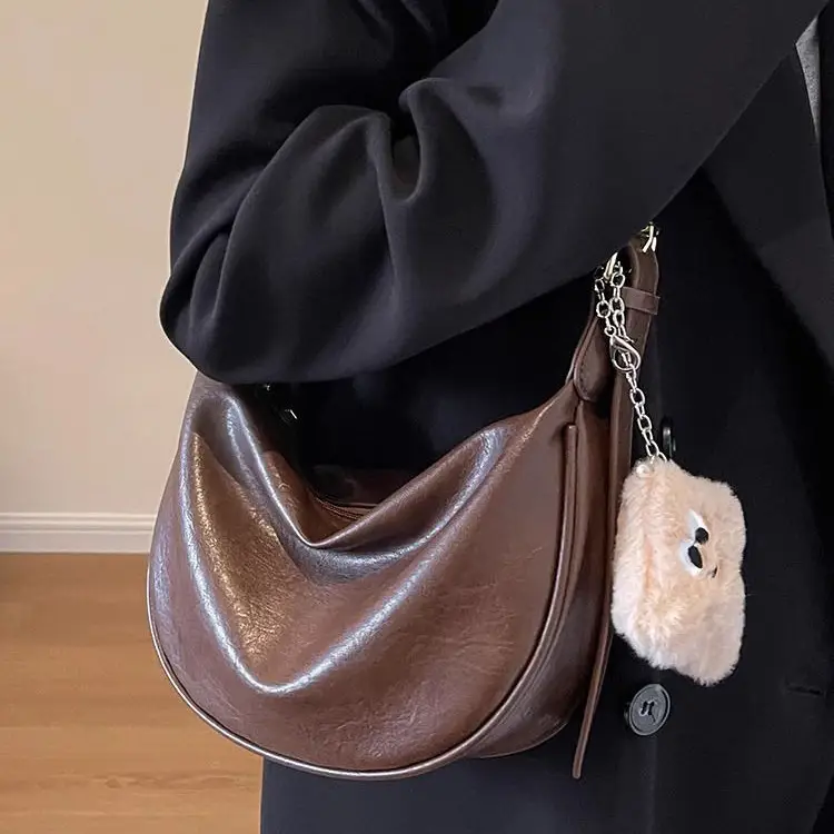Women's Brown Textured Shoulder Bag with Faux Fur Charm