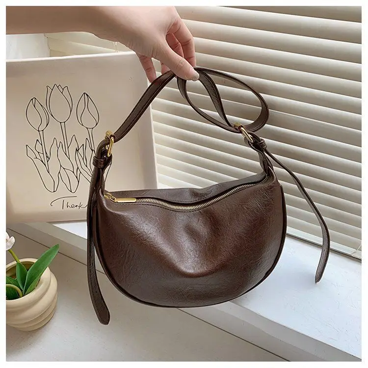 Women's Brown Textured Shoulder Bag with Faux Fur Charm