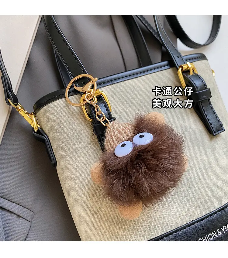 Crossbody Bag for Women with Pom Pom Decor — feature 4