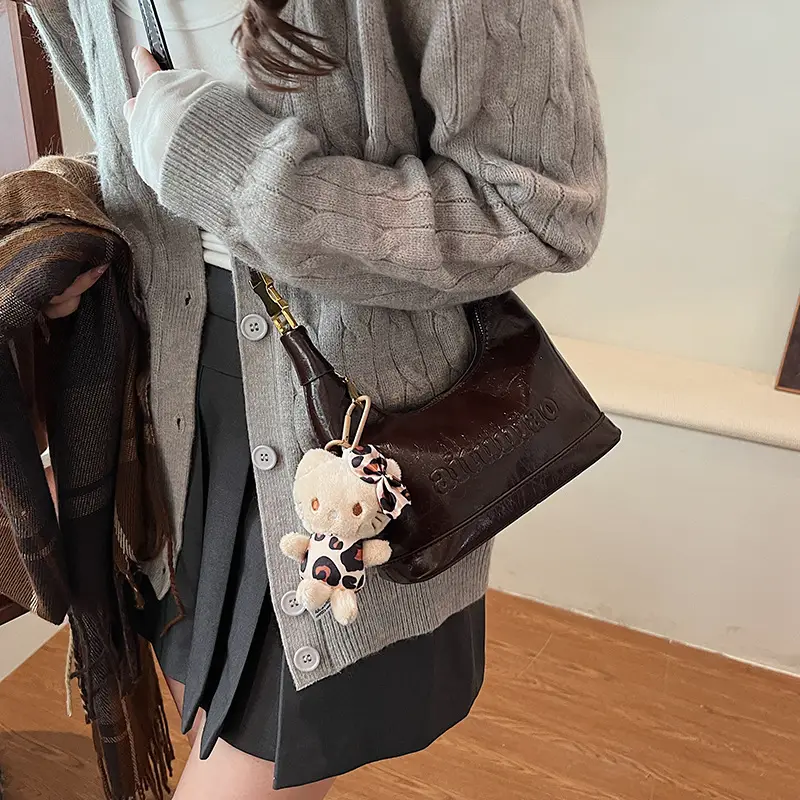 Black Leather Crossbody Bag with Cute Charm