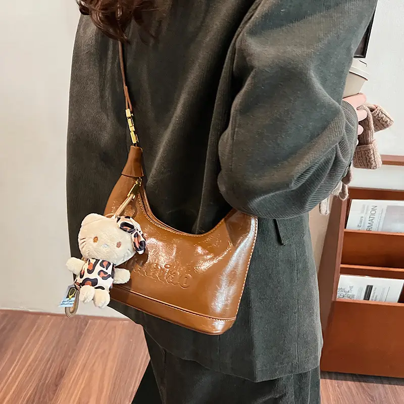 Black Leather Crossbody Bag with Cute Charm