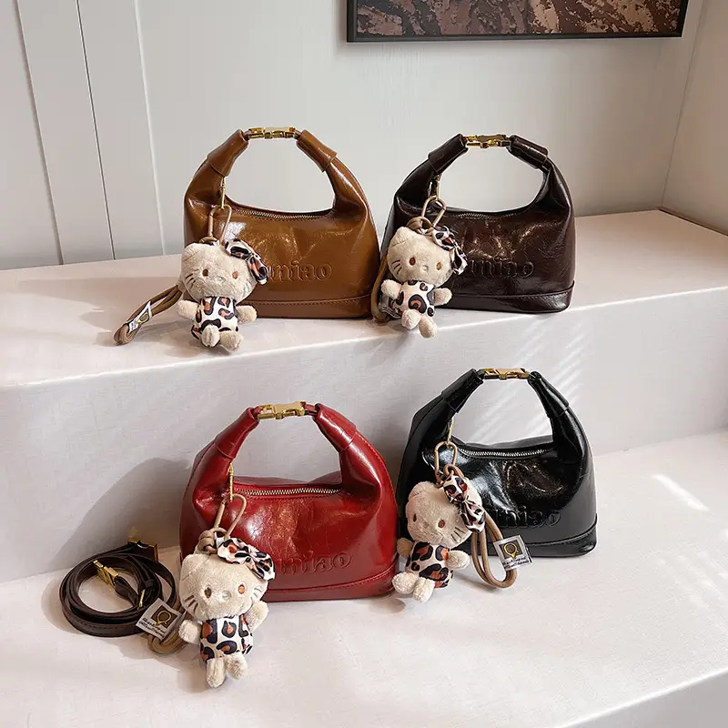Black Leather Crossbody Bag with Cute Charm