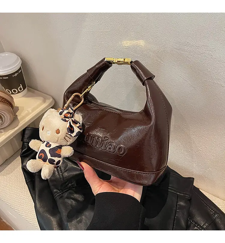 Black Leather Crossbody Bag with Cute Charm — feature 2