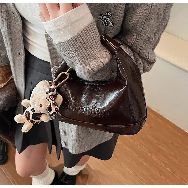 Black Leather Crossbody Bag with Cute Charm — feature 21